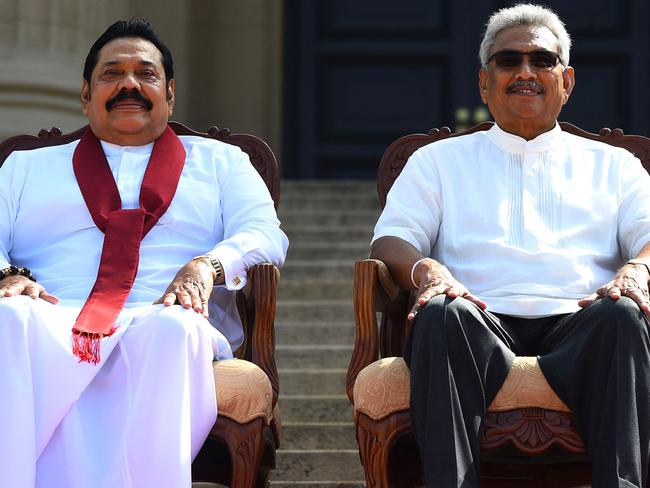 Sri Lanka‘s embattled President Gotabaya Rajapaksa, right, and his brother Mahinda Rajapaksa. Picture: AFP