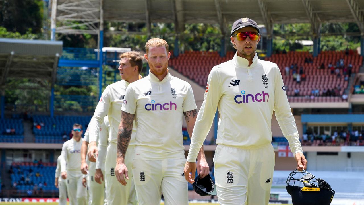 Joe Root (R) and Ben Stokes (2R) of England walk off the field during their defeat to the West Indies at Grenada National Cricket Stadium. Photo: AFP