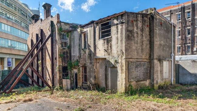 This dilapidated terrace is among a group of properties being sold together in Paddington.