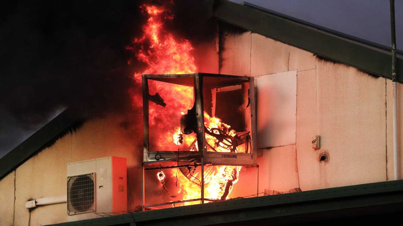 Flames burst from the roof of the Cudgen Leagues club as Queensland Fire Brigade Officers assist local Kingscliff and Tweed Units to fight the fire .Photo Scott Powick Newscorp