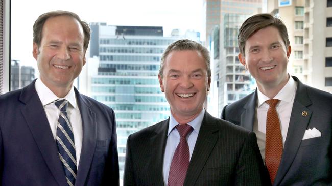 Defence Minister Christopher Pyne with (L) Thomson Geer chief executive partner Adrian Tembel  and (R) GC Advisory principal Adam Howard. (AAP Image/Dean Martin)