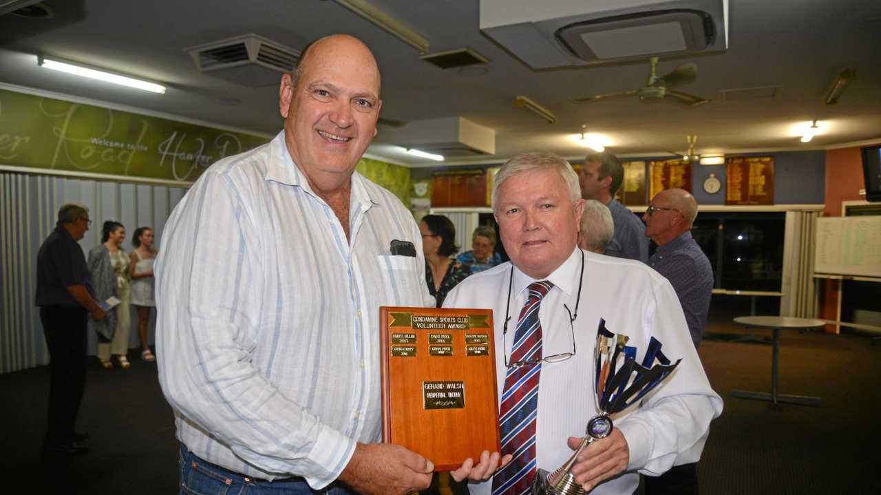 Condamine Sports Club president Ross Bell presents the volunteer award to Wattles rugby league president Glyn Rees. Picture: Gerard Walsh