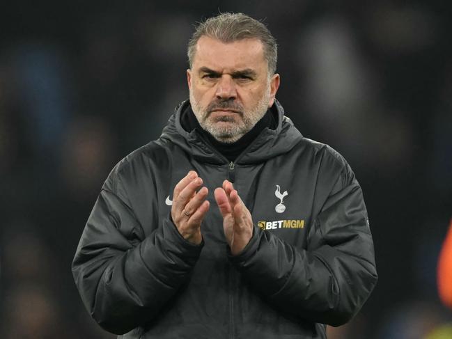 Tottenham Hotspur's Greek-Australian Head Coach Ange Postecoglou applauds fans on the pitch after the English FA Cup fourth round football match between Aston Villa and Tottenham Hotspur at Villa Park in Birmingham, central England on February 9, 2025. Villa won the game 2-1. (Photo by JUSTIN TALLIS / AFP) / RESTRICTED TO EDITORIAL USE. No use with unauthorized audio, video, data, fixture lists, club/league logos or 'live' services. Online in-match use limited to 120 images. An additional 40 images may be used in extra time. No video emulation. Social media in-match use limited to 120 images. An additional 40 images may be used in extra time. No use in betting publications, games or single club/league/player publications. /