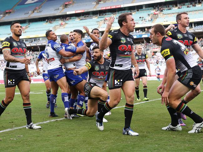 James Maloney isn’t happy as the Bulldogs celebrate.