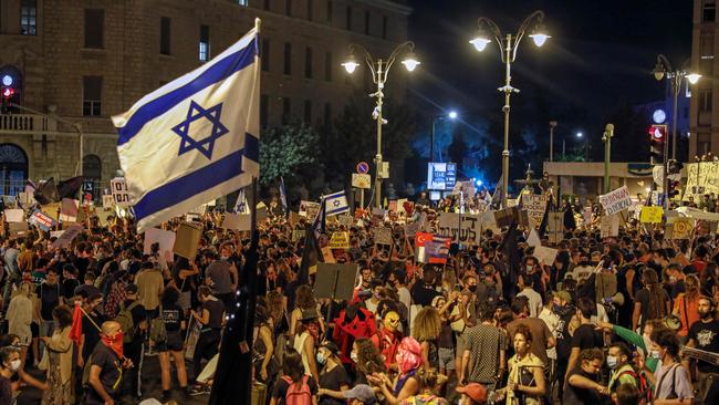 Protesters gather outside the Prime Minister’s residence in Jerusalem at the weekend. Picture: AFP