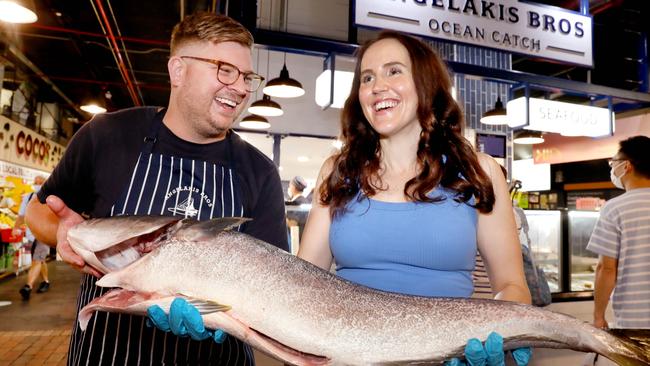 Seafood for this year's Easter table - Alex Knoll of Angelakis Seafoods, with Lauren Brown and a kingfish. PictureK Dean Martin