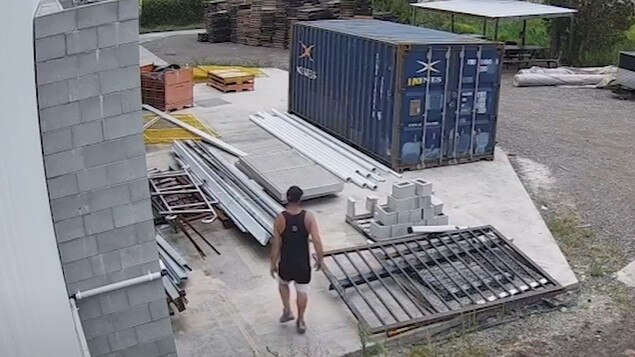 An alleged thief caught on camera after breaking into Vuly company property. Photo: Supplied