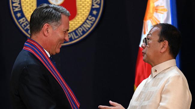 Defence Minister Richard Marles and Philippine Secretary of Defence Carlito Galvez Jr discuss joint patrols of the South China Sea. Picture: AFP