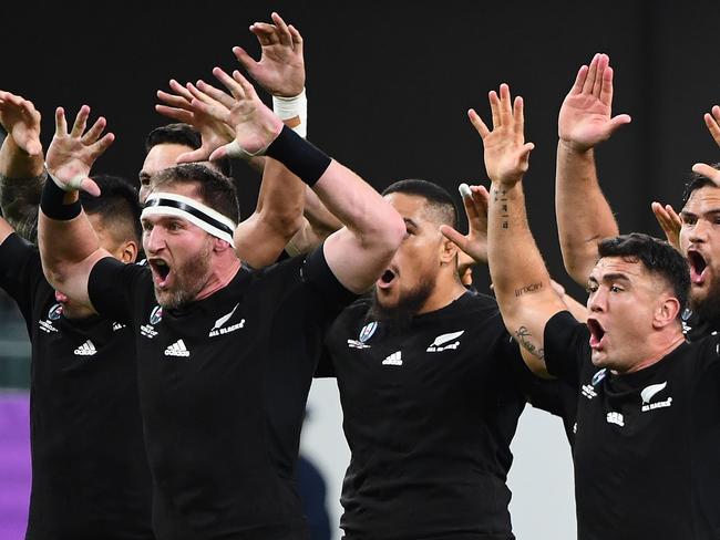 The All Blacks perform the Haka facing their Canadian opponents prior to kick off in the Japan 2019 Rugby World Cup Pool B match between New Zealand and Canada at the Oita Stadium in Oita on October 2, 2019. (Photo by GABRIEL BOUYS / AFP)