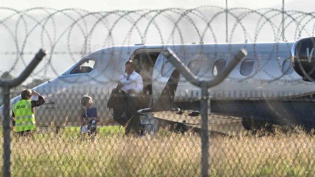 QLD Premier Steven Miles disembarks from a private jet at the Government Air Wing, Brisbane Airport. Picture: Lyndon Mechielsen