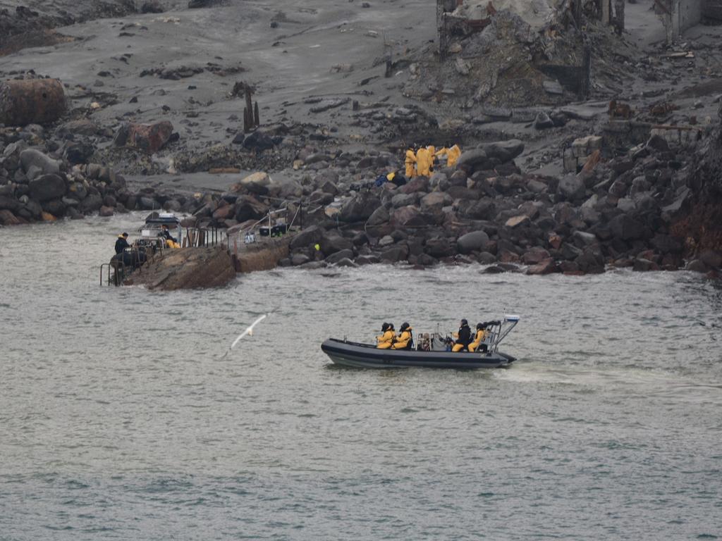 A team went back to the island days after the eruption in an attempt to recovery the bodies of the victims. Picture: New Zealand Defence Force/AP