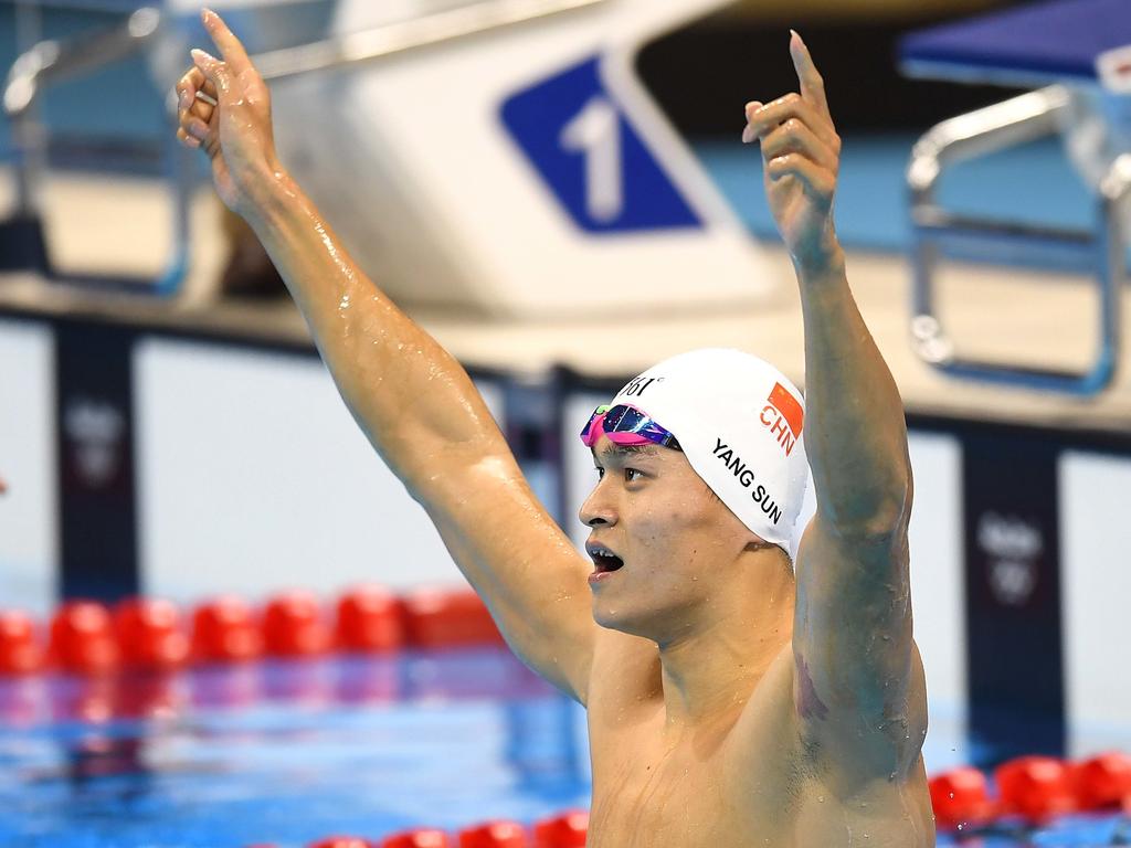 Sun Yang of China celebrates winning the Men's 200m Freestyle final at the Olympic Aquatics Stadium on day three, of the Rio 2016 Olympic Games in Brazil, Monday, Aug. 8, 2016. (AAP Image/Lukas Coch)