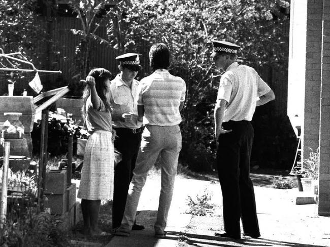 Police talk to neighbours at the Newmarket flats.