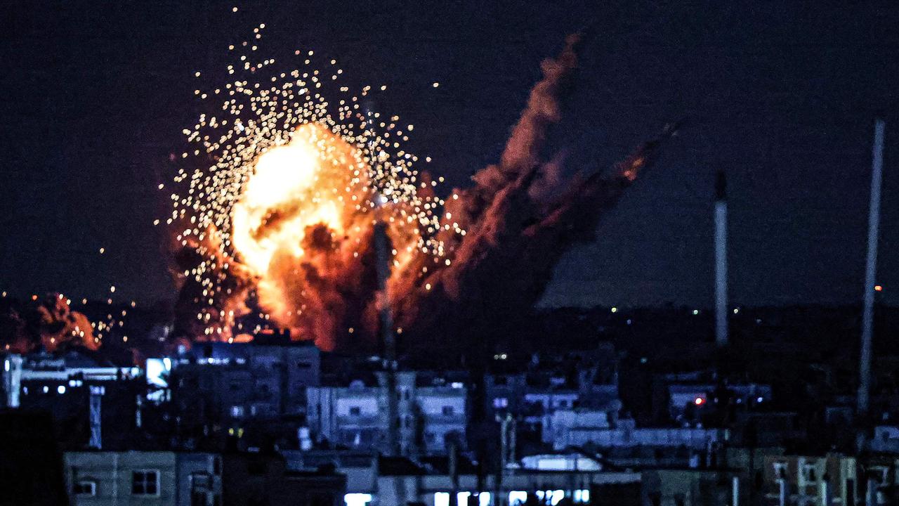 A ball of fire and smoke rise above buildings during an Israeli strike on Rafah in the southern Gaza Strip, on October 15. Picture: SAID KHATIB / AFP