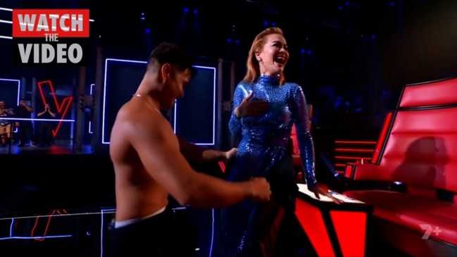 Rita Ora gets a steamy strip tease (The Voice)