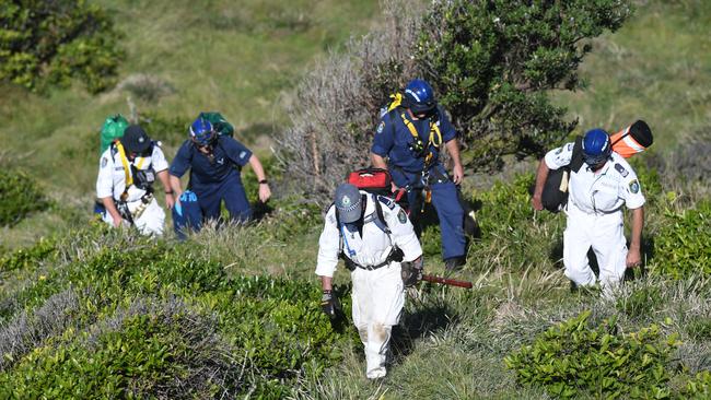 Police rescue search around the headland of the Byron Bay Lighthouse.