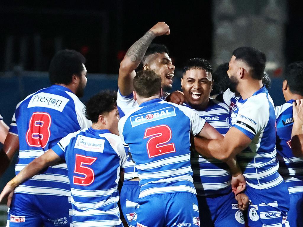 Cairns Brothers celebrate winning the FNQRL A grade premiership after beating the Ivanhoe Knights 18 points to 14 in the grand final match at Barlow Park. Picture: Brendan Radke