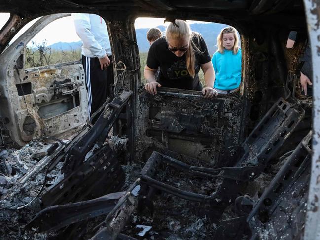 The vehicles the ambushed members of the LeBaron family were travelling in were burnt out after bullets rained down on them. Picture: AFP