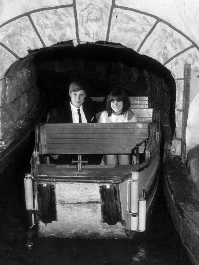 A couple coming out of the River Caves ride at Luna Park in 1968. Picture: HWT Library.