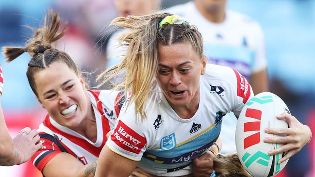 Niall Williams-Guthrie of the Titans is tackled during the NRLW Semi Final. Picture: Matt King/Getty Images