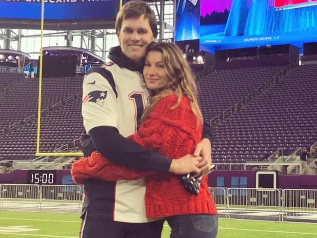 Gisele Bundchen and Tom Brady inside the Super Bowl stadium.