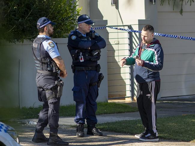 Police at the crime scene in Russell Lee on Friday. Picture: Jeremy Piper