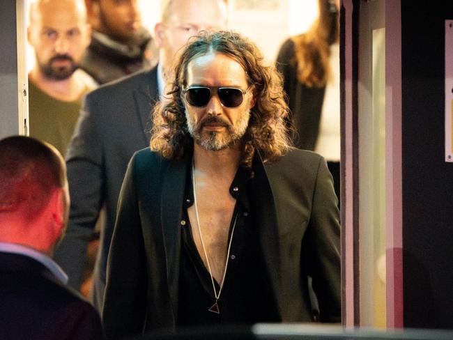 Russell Brand leaves the Troubabour Wembley Park amid sexual assault allegations. Picture: Getty Images