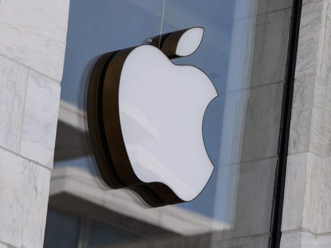 (FILES) In this file photo taken on September 14, 2021 the Apple logo is seen at the entrance of an Apple store in Washington, DC. - Over a dozen women accused Apple of mishandling sexual misconduct claims they lodged while working for the iPhone maker, according to a Financial Times report out on August 4, 2022. (Photo by Nicholas Kamm / AFP)