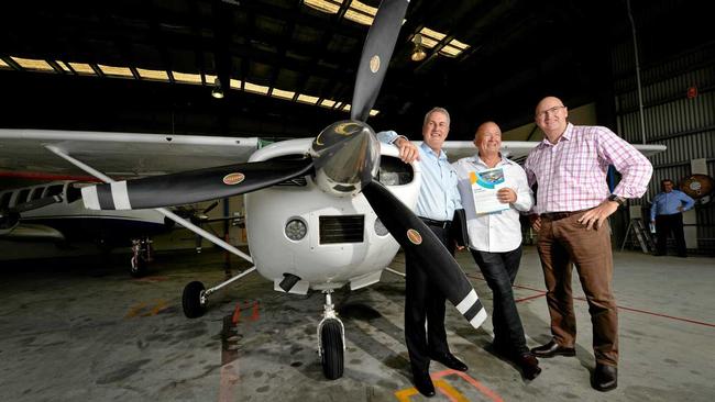 SKY IS THE LIMIT: Mayor Greg Williamson, John Glanville of GW3 and Mackay Airport manager Rob Porter have launched their plan to attract a Qantas Pilot Training Academy to the region. Picture: Stuart Quinn