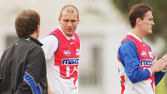 Martin Pike talks with former coach Denis Pagan at the Kangaroos.