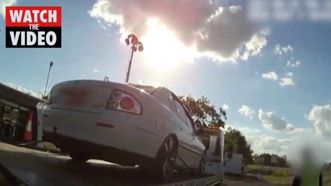 Woman caught trying to cross Qld border in car boot