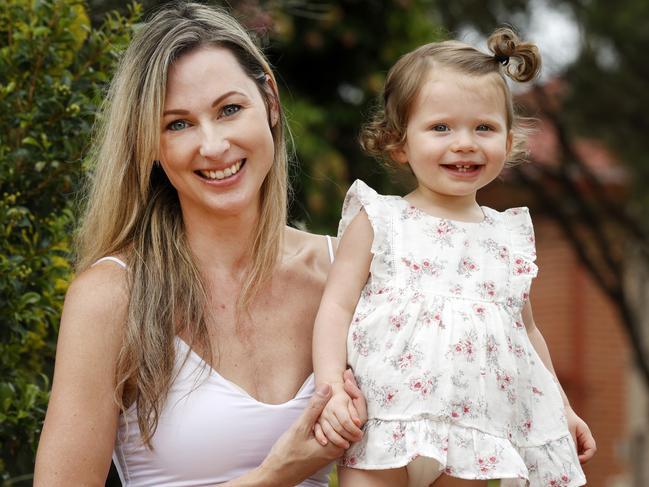 Natalie Reeves with her daughter Adeline after she was told as a teen she could never have a baby due to her heart issues. Picture: Jonathan Ng