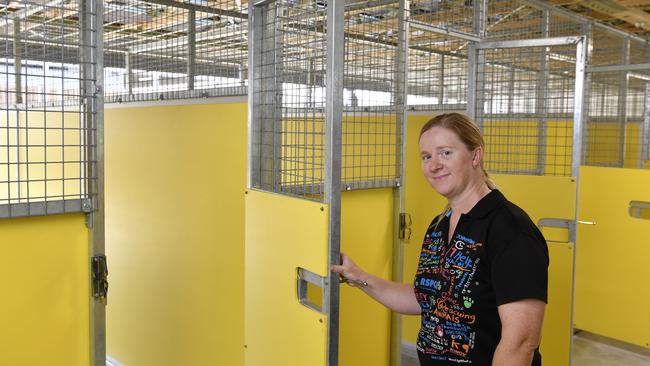 RSPCA Toowoomba shelter manager Cassandra Walker walks through the kennel part of the facility, to be used to dogs up for adoption. Picture: Kevin Farmer