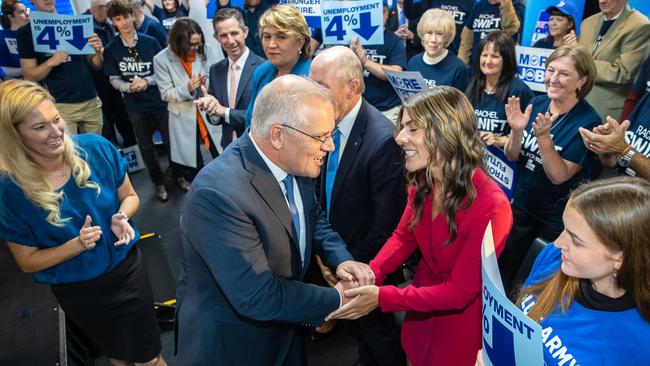 Scott Morrison presses the flesh with his Liberal colleagues at a campaign rally in Adelaide. Picture: Jason Edwards