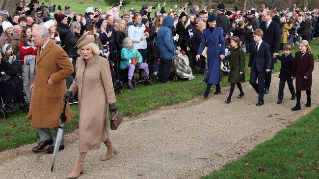 King Charles III (L), Queen Camilla (2L) Catherine, Princess of Wales (6R), Princess Charlotte (5R), Prince George (4R), Prince William (3R), Prince Louis of Wales (2R) and Mia Tindall (R) arrive for the Royal Family's traditional Christmas Day service at St Mary Magdalene Church on the Sandringham Estate. Picture: AFP