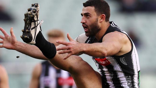 Collingwood's Alex Fasolo kicks a last-quarter goal. Picture: Michael Klein