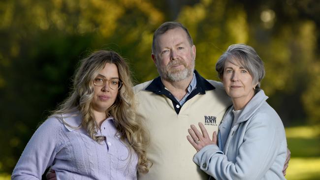 Chelsea Ireland's sister Maddie, dad Greg Ireland and mum Debra in Botanic Park. Picture: Naomi Jellicoe