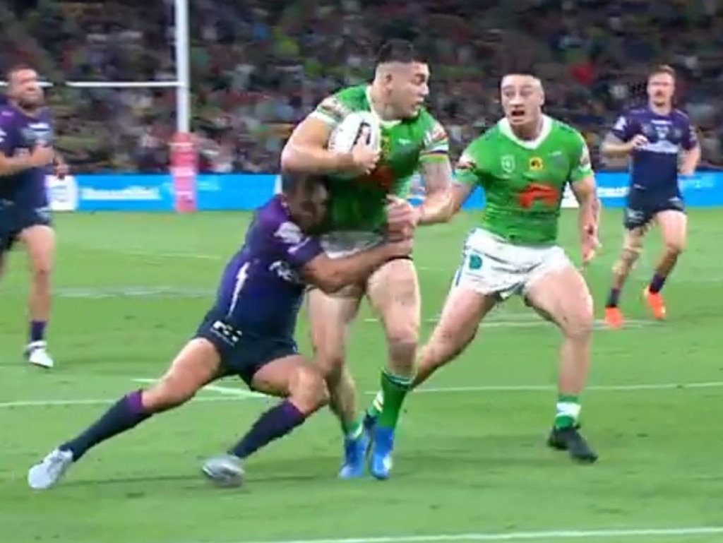 Cameron Smith makes a miracle tackle.