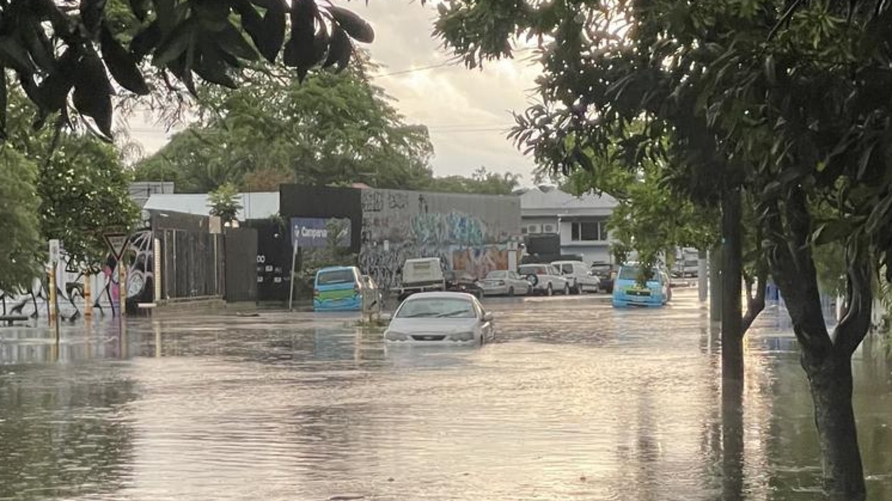 A car stuck in floodwaters in Longlands St, East Brisbane, on Tuesday. Picture: Facebook.