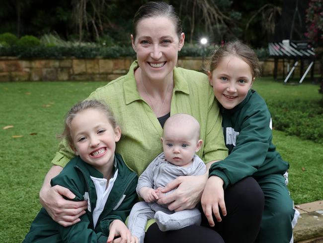 Dr Jana Pittman pictured with her daughters Emily, 7, Jemima, 5, and baby Willow, 5 months. Picture Supplied