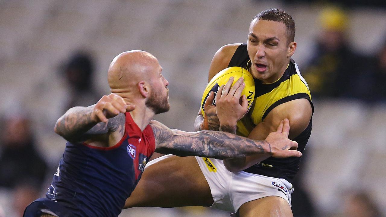 Shai Bolton marks in front a lunging Nathan Jones. Picture: Michael Klein