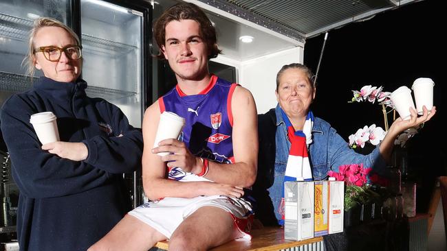 Queenscliff Football and Netball Club's Laura Clarke and Ned Coffey meet with Noelle Roob of Noelle's Coffee after Queenscliff council informed the club it was not permitted to have a coffee van at the oval.