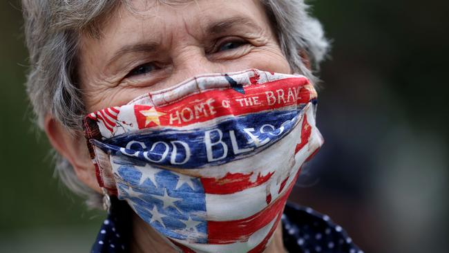 A supporter of Supreme Court nominee Judge Amy Coney Barrett rallies outside the Senate office building where her confirmation hearing is taking place. Picture: AFP