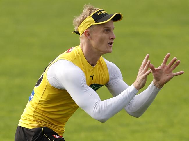 Noah Cumberland of the Tigers marks the ball during a Richmond Tigers AFL training session at Punt Road Oval. (Photo by Darrian Traynor/Getty Images)