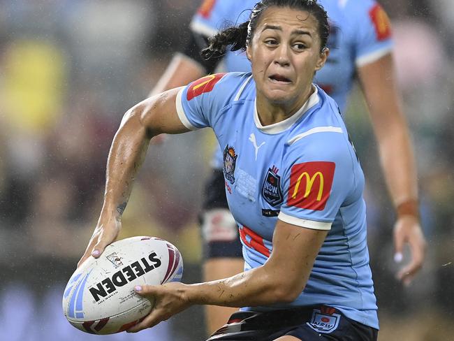 TOWNSVILLE, AUSTRALIA - JUNE 27:  Corban Baxter of the Blues passes the ball during game three of the 2024 Women's State of Origin series between Queensland Maroons and New South Wales Sky Blues at Queensland Country Bank Stadium on June 27, 2024 in Townsville, Australia. (Photo by Ian Hitchcock/Getty Images)