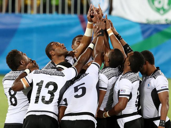 Fiji win Gold and the Countries first ever medal at the Rio Olympics 2016 Men's Rugby Sevens Gold Medal game between Fiji and Great Britain. Pics Adam Head