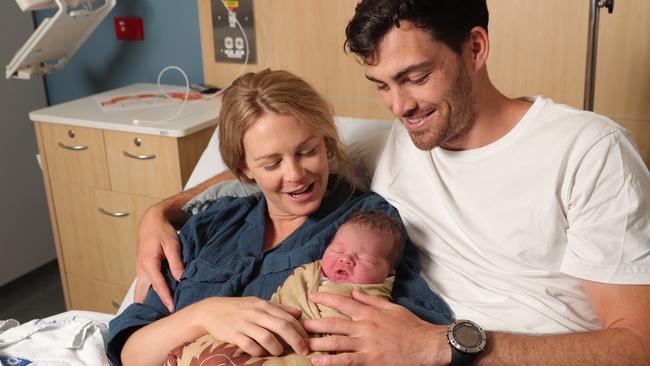 Sam Taylor and Eliza Jorgensen from Burleigh Heads with their newborn son, August Van Taylor, who was born in a hurry on New Years morning at Gold Coast University Hospital. Picture Glenn Hampson