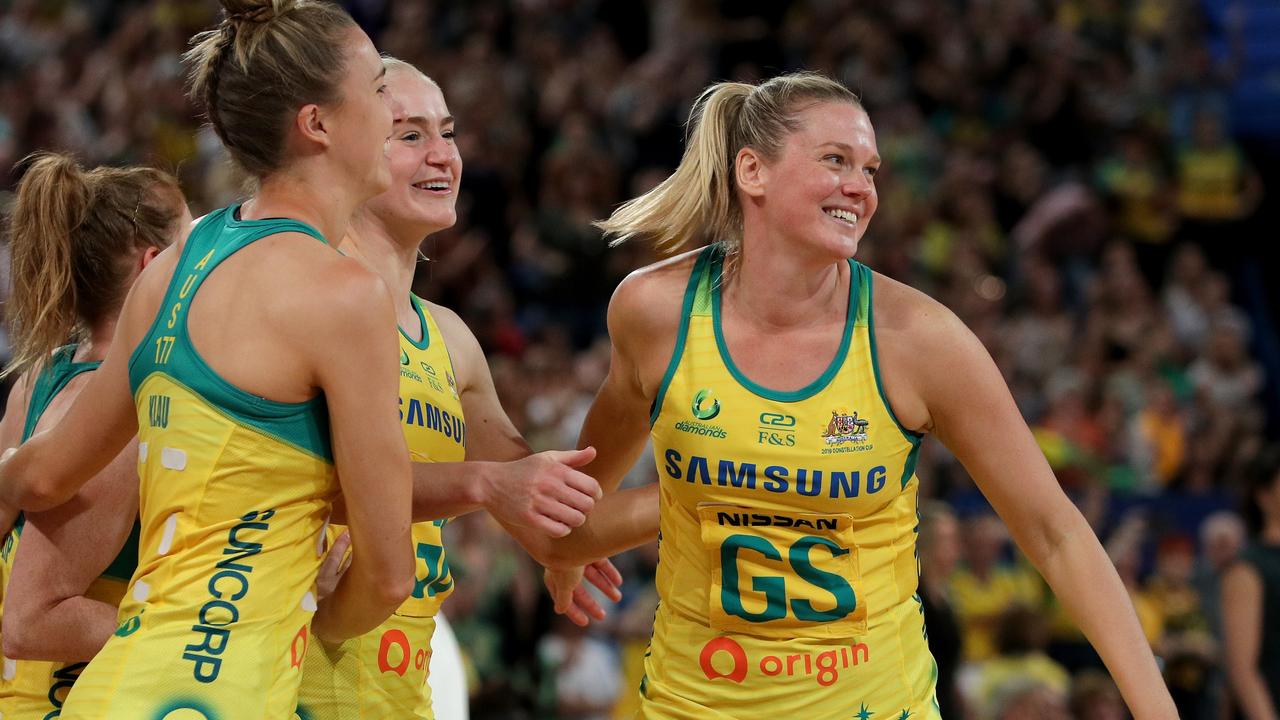 Caitlin Thwaites celebrates with Diamonds teammates. Picture: Richard Wainwright