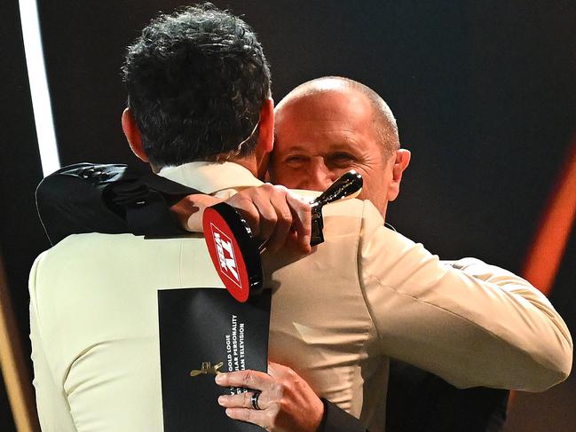 Larry Emdur embraces Sam Pang after winning the Gold Logie Award for Most Popular Personality on Australian Television. Picture: Getty