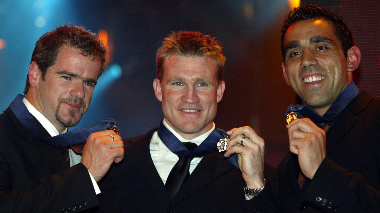 Mark Ricciuto, Nathan Buckley and Adam Goodes after winning the Brownlow Medal.